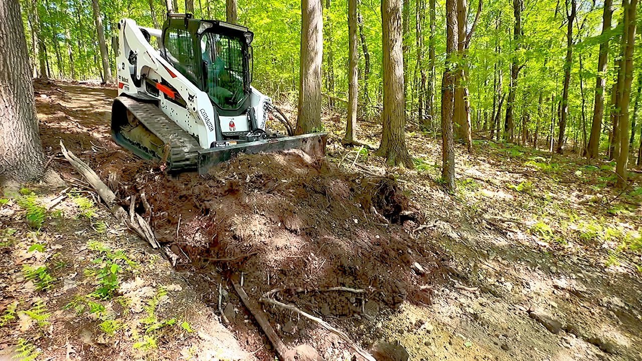 Skid steer doing dirt work in Edmond, OK